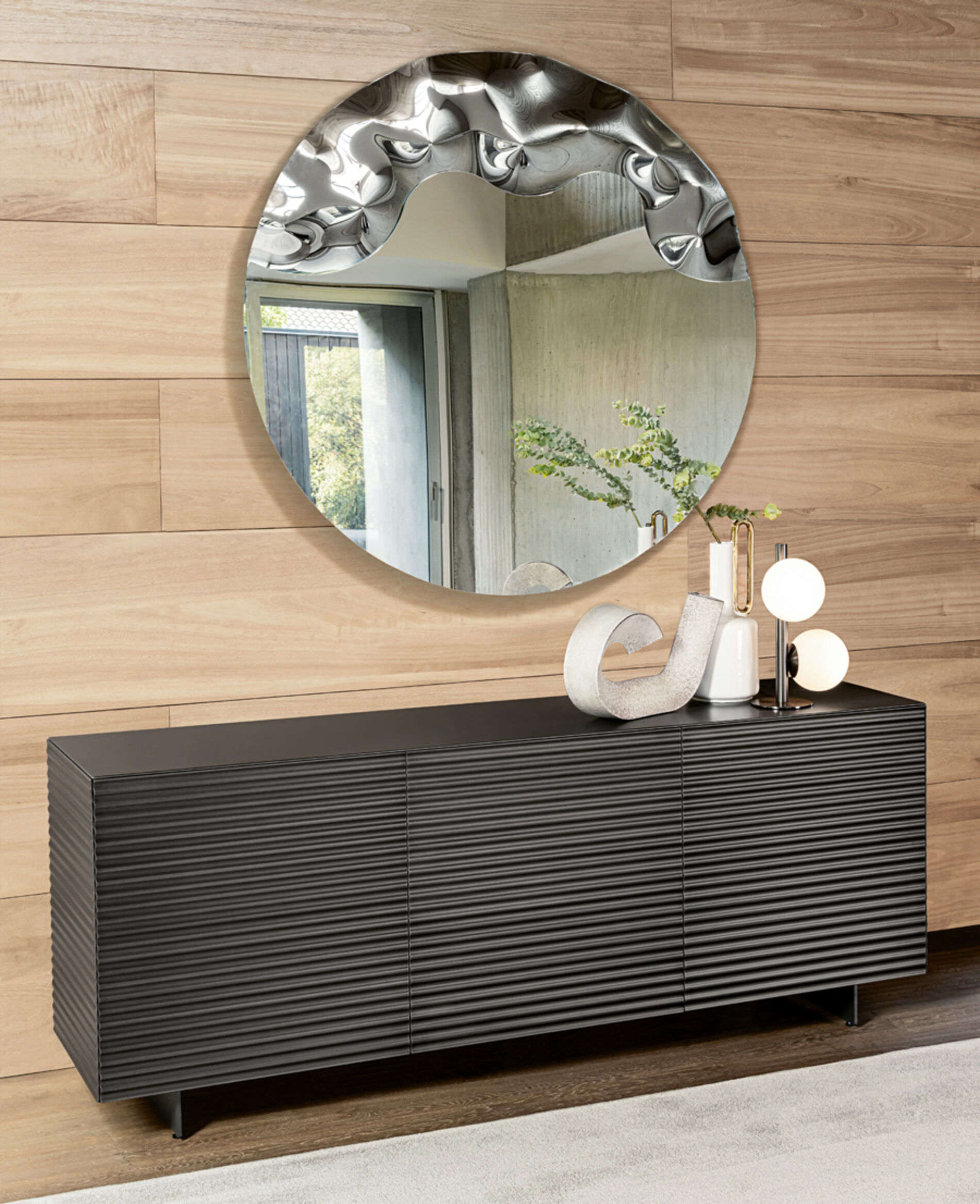 specchio di design rotondo tridimensionale